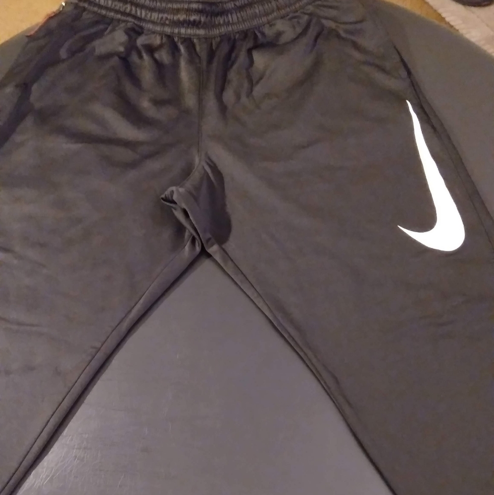 Brand New Black Nike sweatpants.  Never worne size Large  NWOT !!